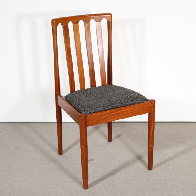 Vintage mid-century teak dining chair by MEREDEW with vertical slatted back and dark upholstered seat, British Scandinavian.