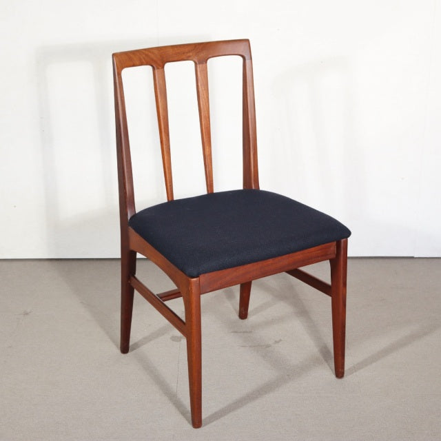 Vintage YOUNGER teak dining chair with mid-century British design, navy upholstered seat, and slender tapered legs from.