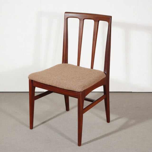 Mid-century British vintage teak dining chair by Younger with brown upholstered seat and slender tapered legs.