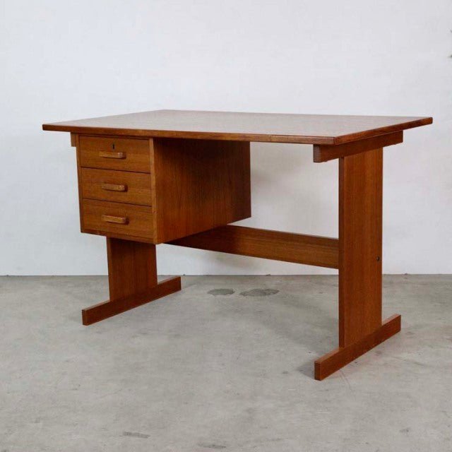 Mid-century vintage teak desk from Denmark with sleek rectangular top, three side drawers, and sturdy straight legs.