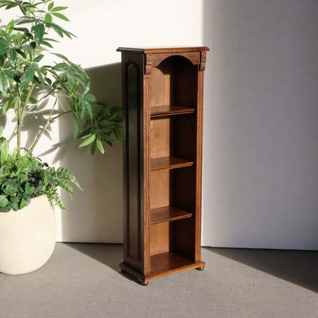 Tall vintage teak cabinet with three open shelves, British mid-century design, rich wood grain and carved top detail.