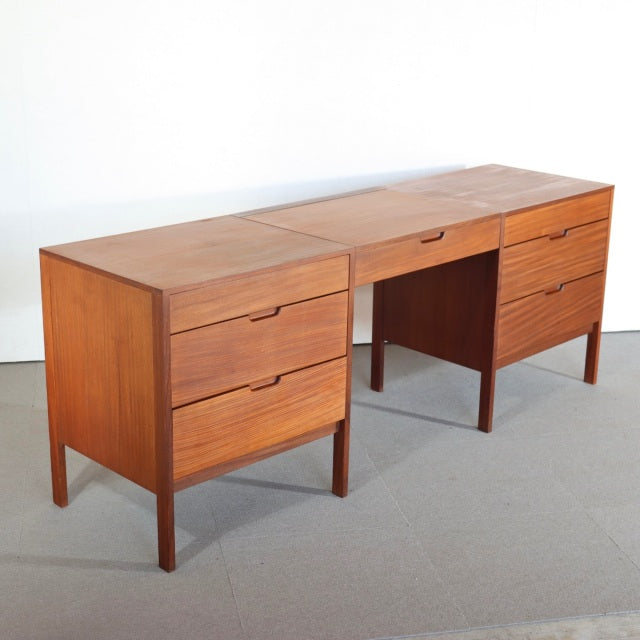 Vintage teak sideboard by Fyne Ladye featuring British mid-century design with clean lines, tapered legs, and smooth wood.
