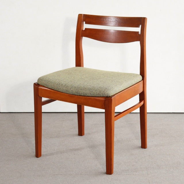 Vintage mid-century teak dining chair by Nathan with curved backrest and light gray upholstered seat from Denmark.