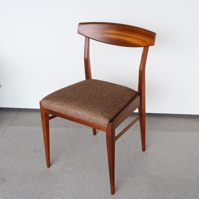Mid-century British dining chair by McIntosh in vintage teak with rich wood grain and brown upholstered seat, slender.