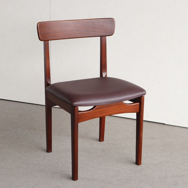 Vintage mid-century teak dining chair by YOUNGER with sleek British-Denmark design, clean wood grain, and brown leather seat.