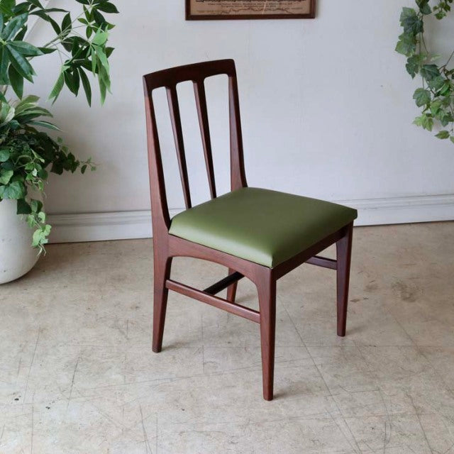 Vintage mid-century British teak dining chair by A.Younger Ltd with vertical slat backrest and olive green upholstered seat.