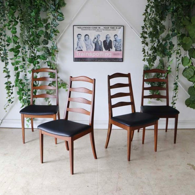 Set of four vintage British G-Plan ladder back dining chairs in teak with black leather seats, mid-century Danish design,.